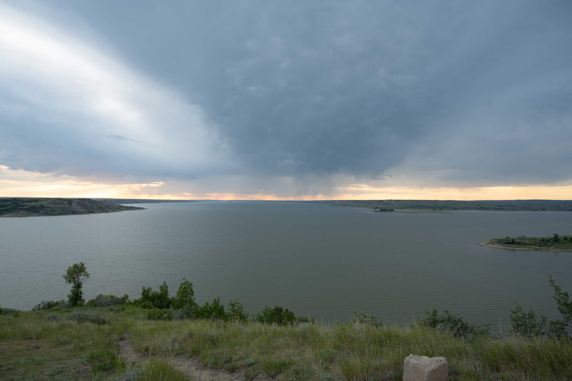The creation of the Garrison Dam in 1953, by the U.S. Army Corps of Engineers, flooded most villages on the Fort Berthold Reservation and forced the relocation of 325 families.The dam also created Lake Sakakawea which divides the reservation in half. New Town, ND  (Photo by Nina Berman). 